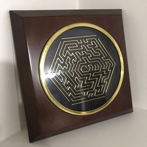 Vintage maze puzzle ball game on wood frame
